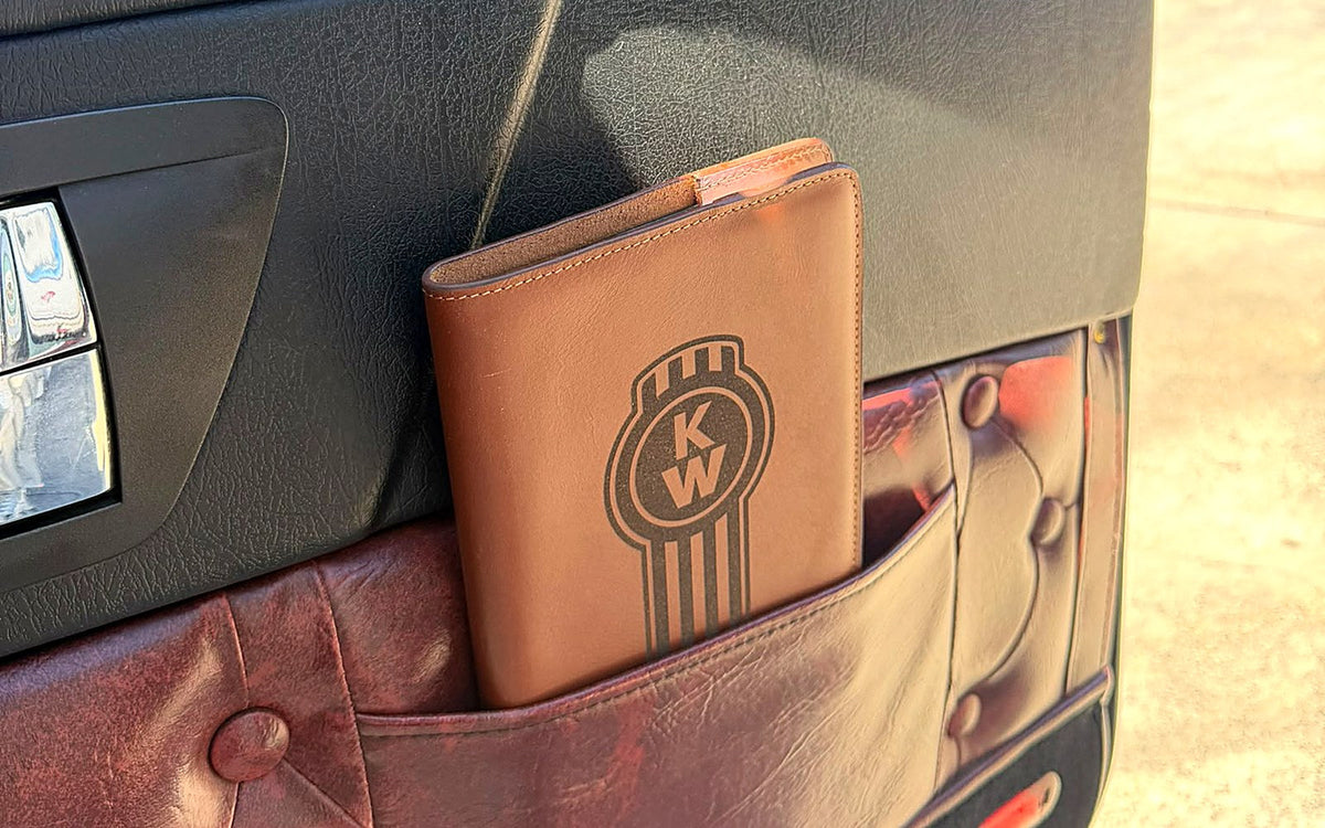 Personalised engraved leather notebook in a Kenworth door pocket